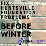A brick wall with the words fix huntsville foundation problems before winter